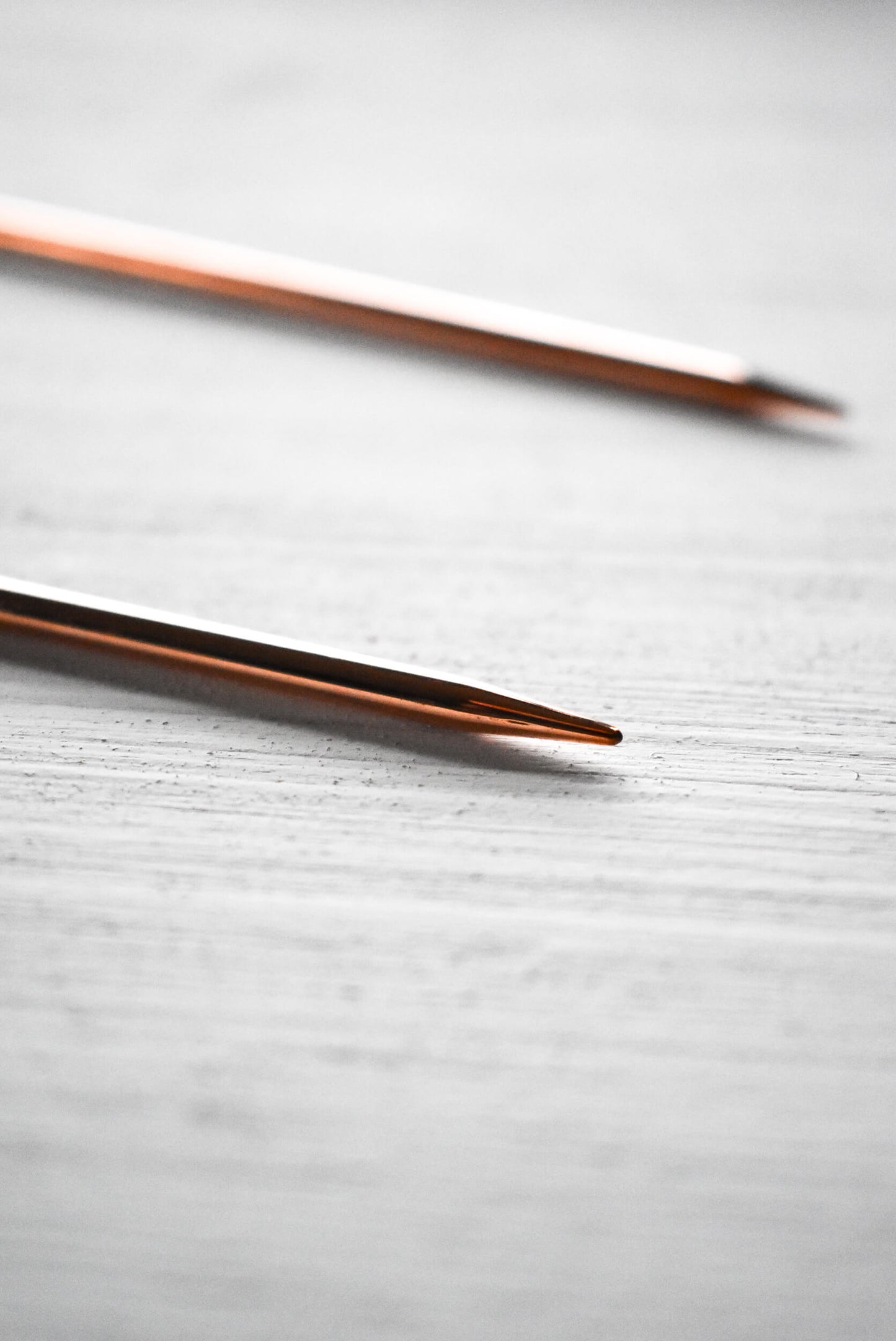 Detail of the copper knitting needles.