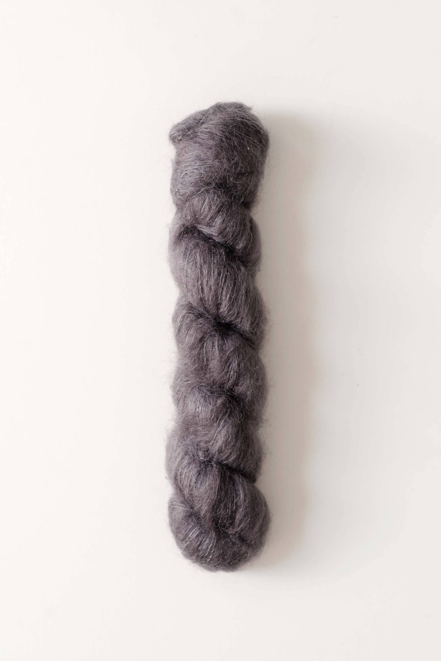 Dove silk mohair yarn in Windjammer lavender gray color.