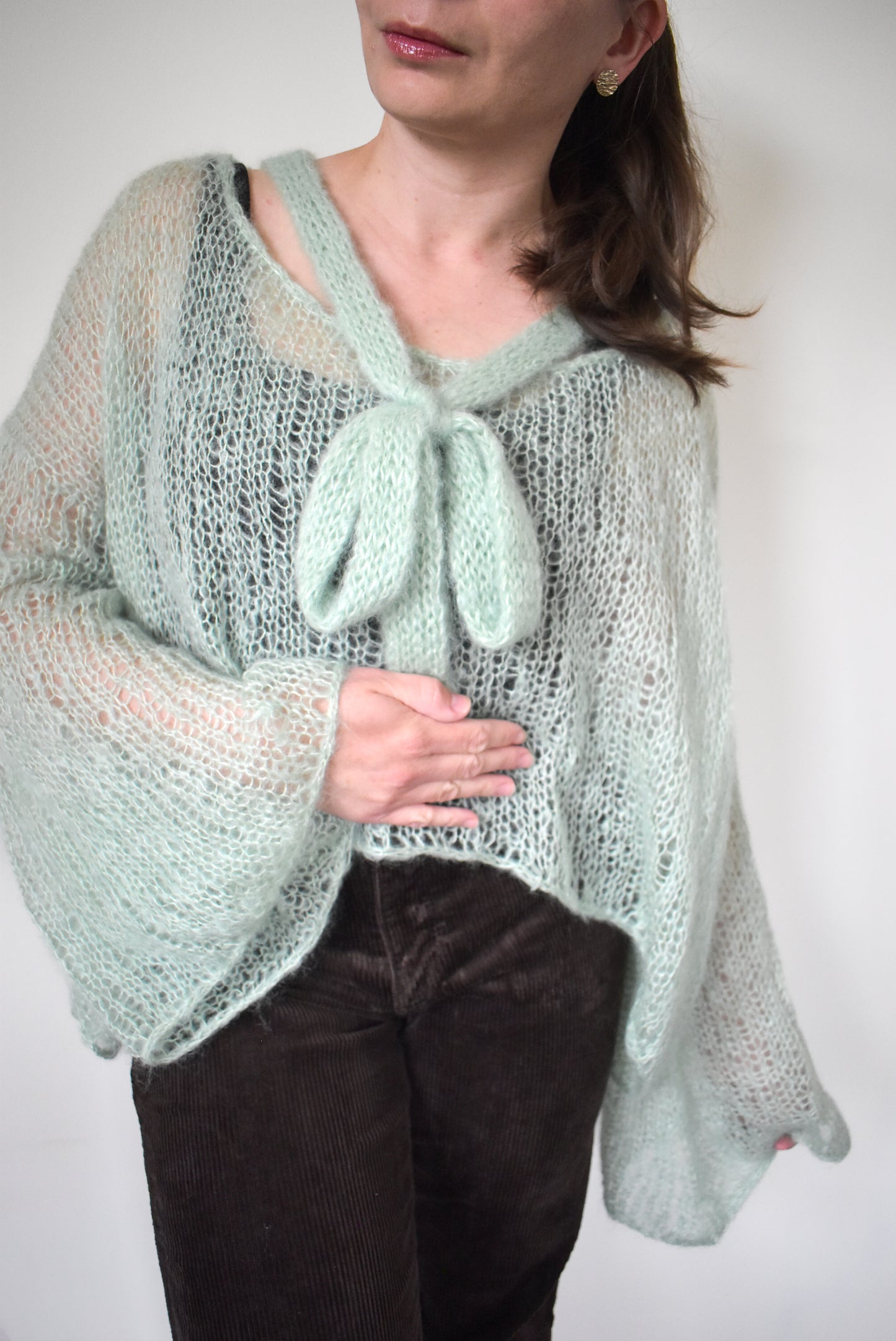 Light green mohair pullover knitting pattern for women.