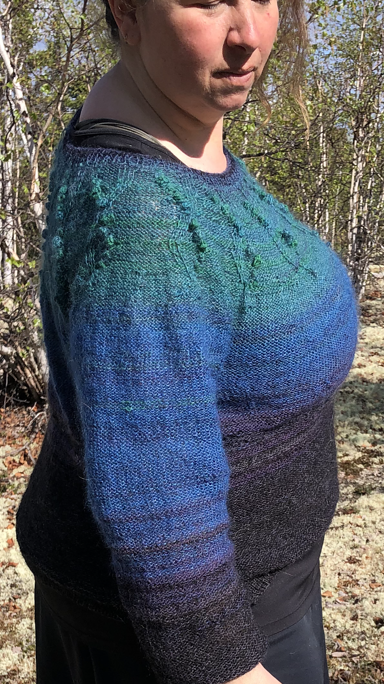 Seaweed pullover knitting pattern worked in multicolored yarn in plus size.