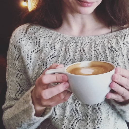 Textured top down sweater knitting pattern with lace.