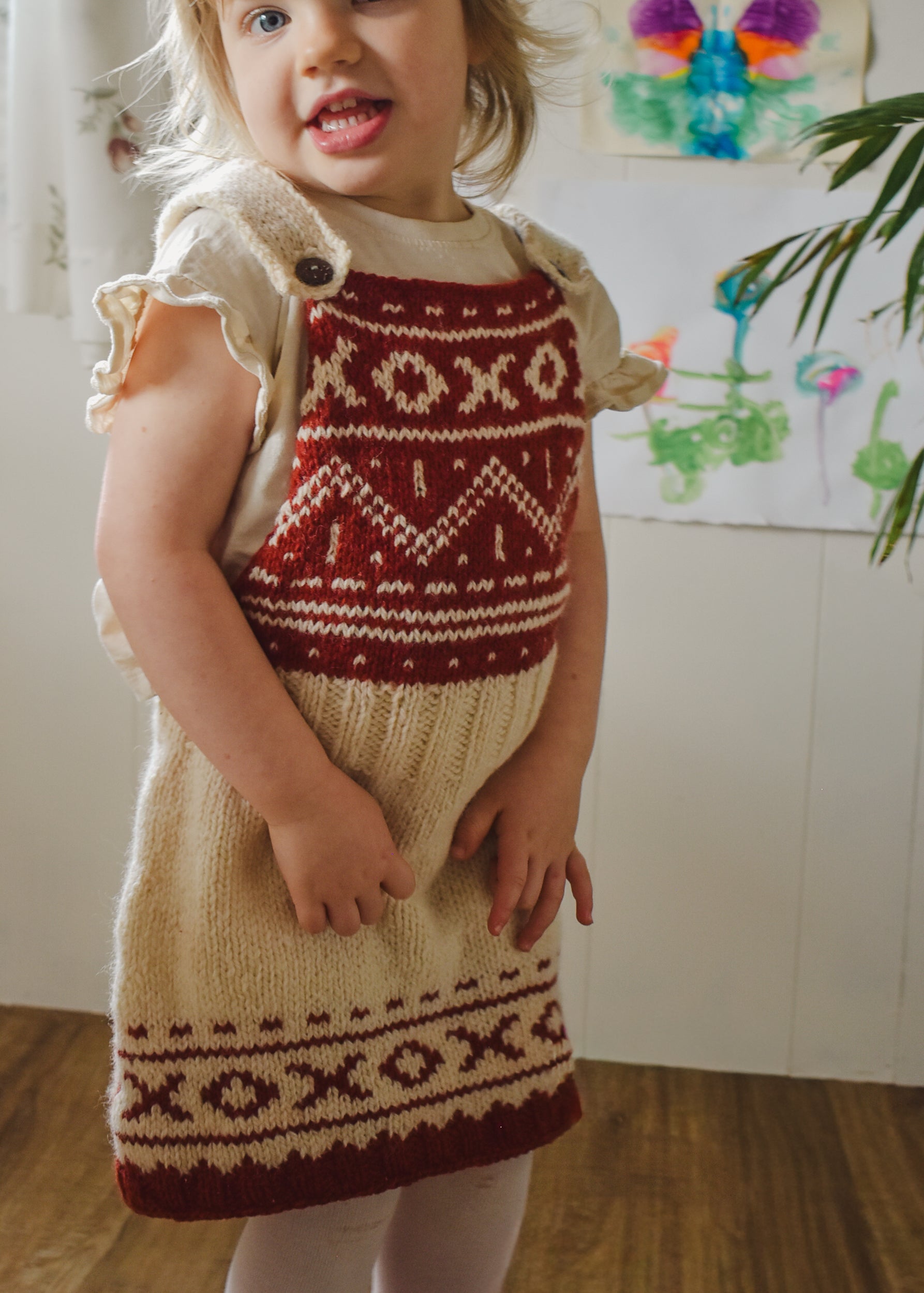 Christmas overall dress knitting pattern for toddlers.