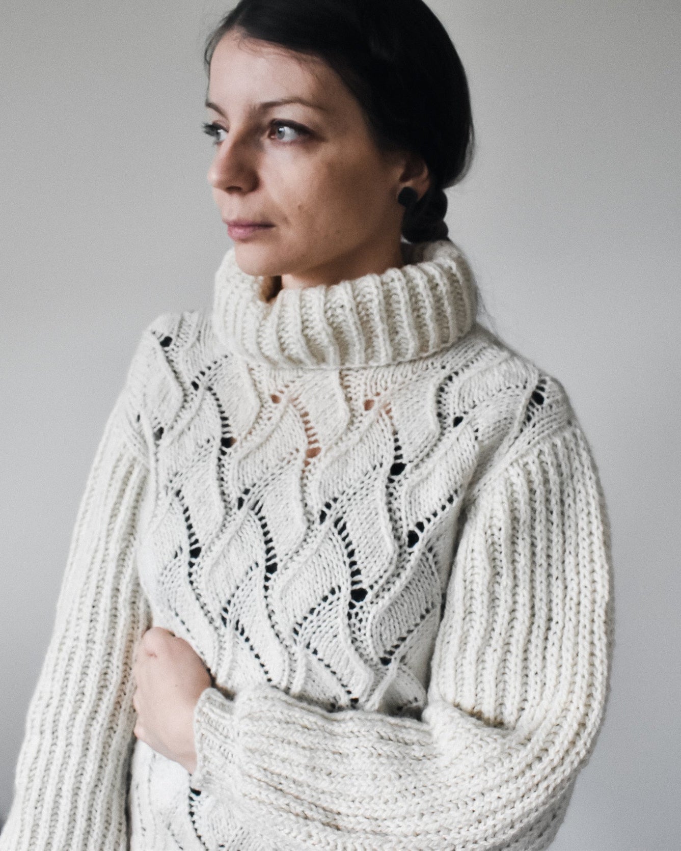 White turtleneck knitting pattern.