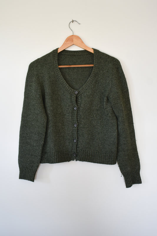 A photo showing the Deepwood Cardigan knitting pattern.