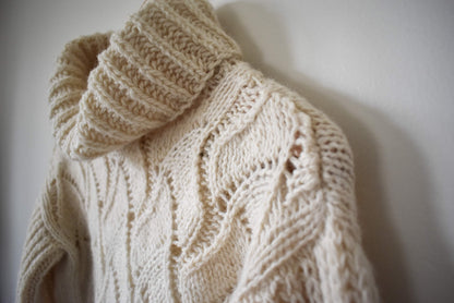 Sweater knitting pattern with texture and a turtleneck.