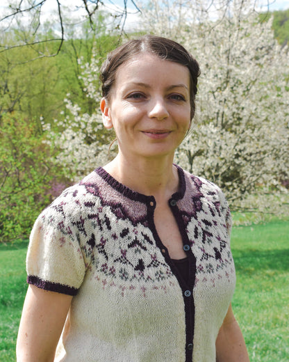 Spring cardigan knitting pattern with a fair-isle pattern.