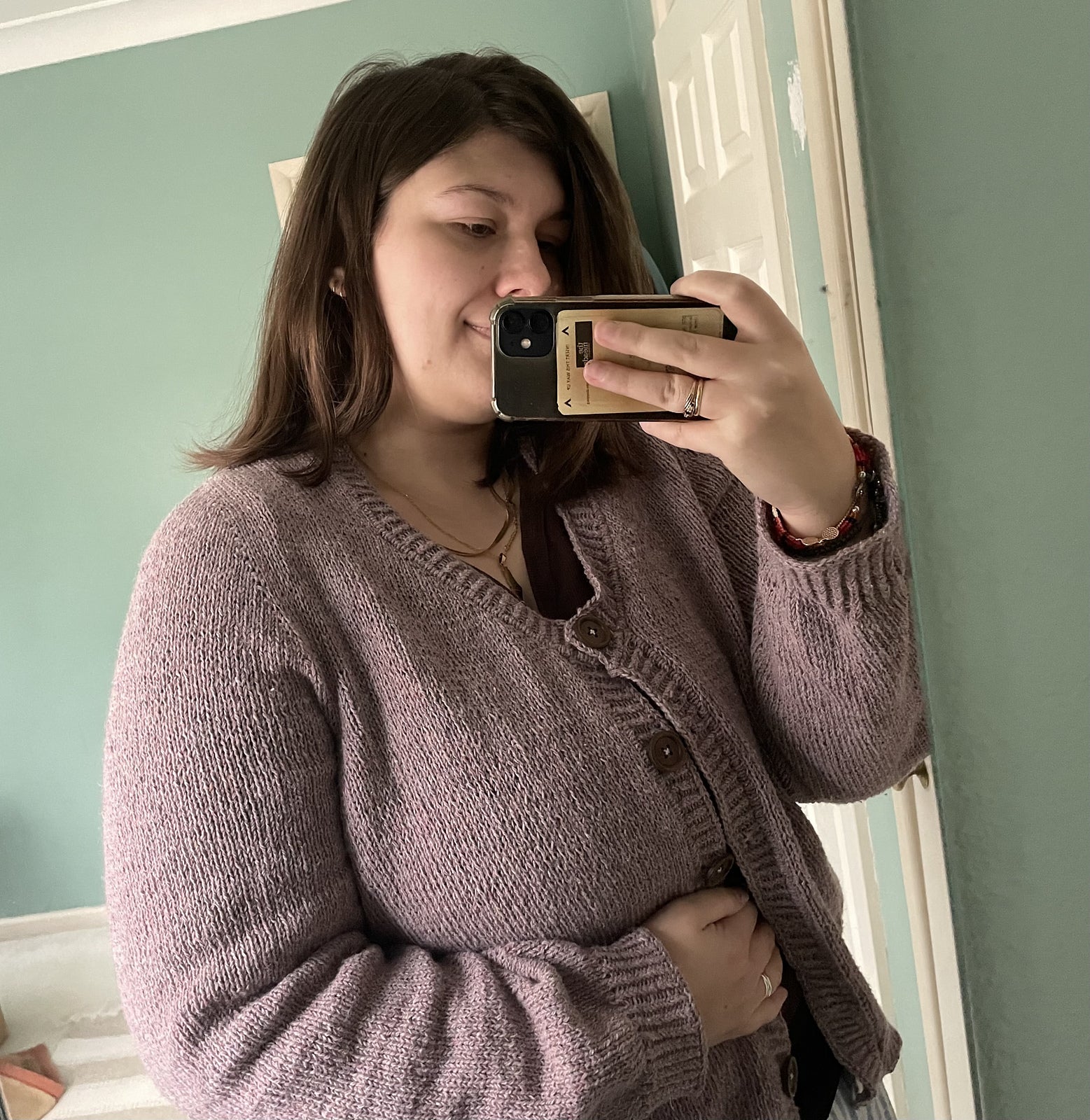 Image showing a plus size project of the Deepwood Cardigan knitting pattern.