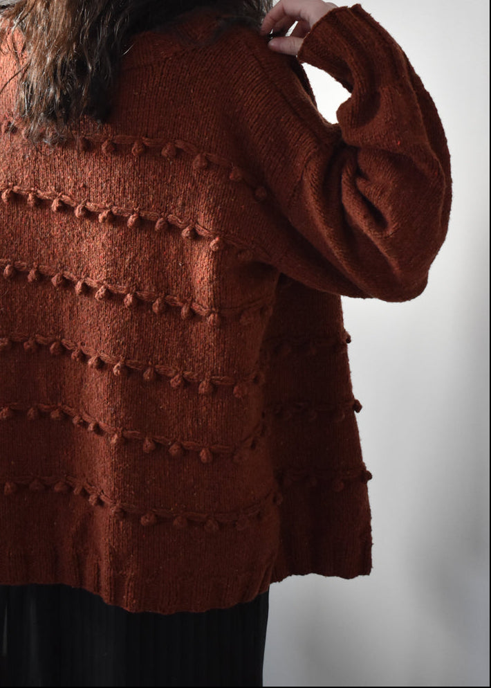 Oversized textured cardigan knitting pattern with bobbles.