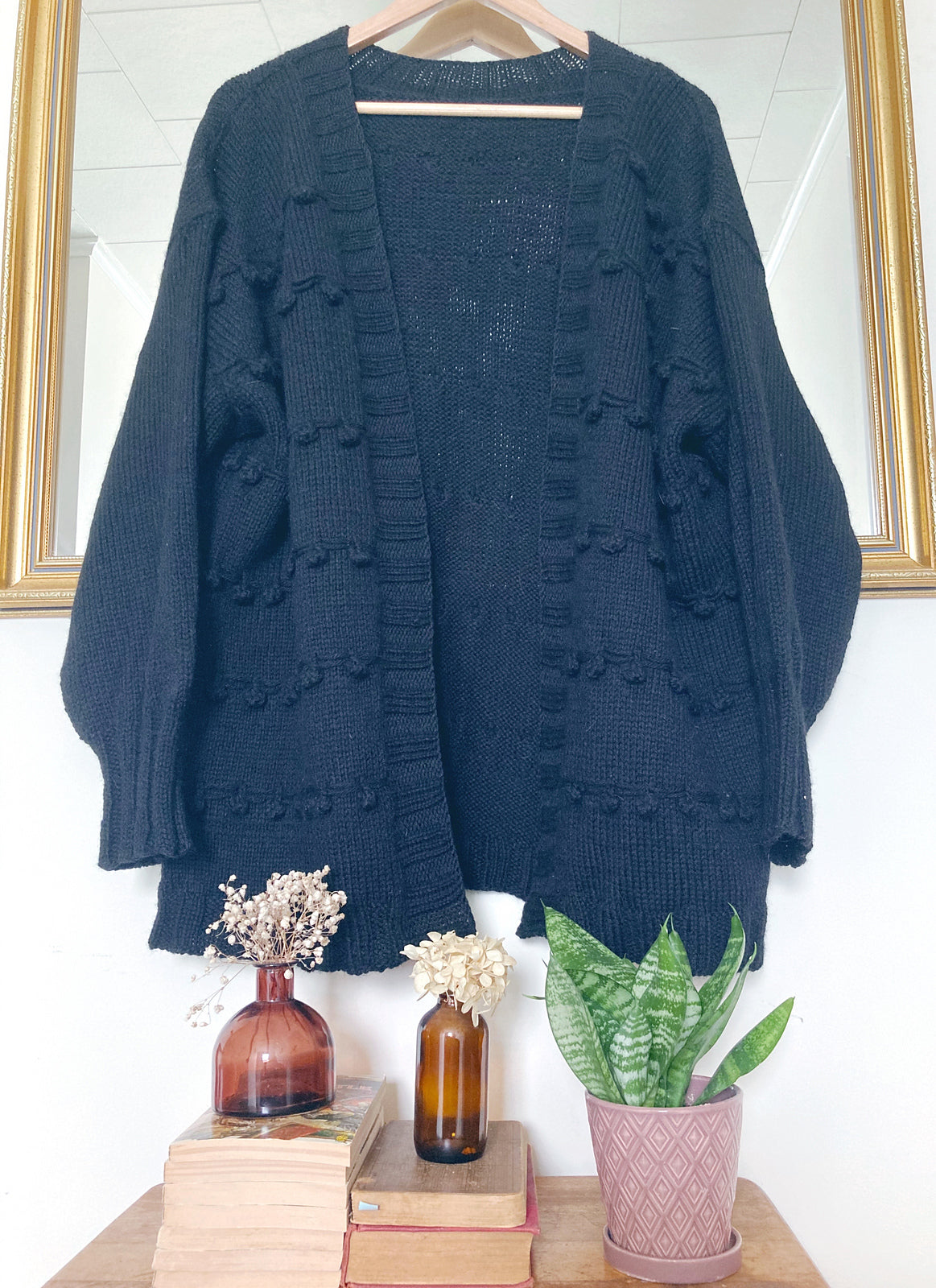 Gooseberry Cardigan knitting pattern worked in blue yarn.