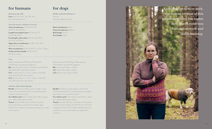 A woman wearing a patterned sweater with a dog in a forest setting.