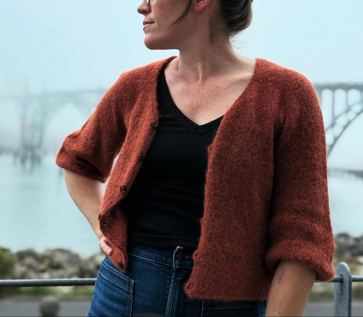Cloud Cardigan knitting pattern in a rust color.