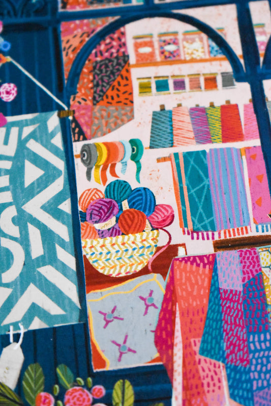 Detail of yarn balls in the Stitch by Stitch puzzle.