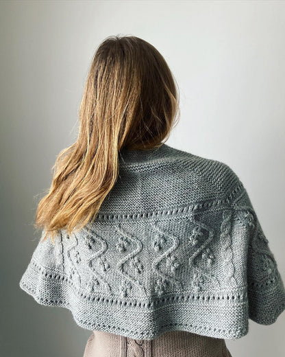 Lady of the lake cable shawl knitting pattern for women.