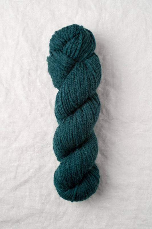 Lark 100% Wool Worsted Weight Yarn in blue-green Peacock color.