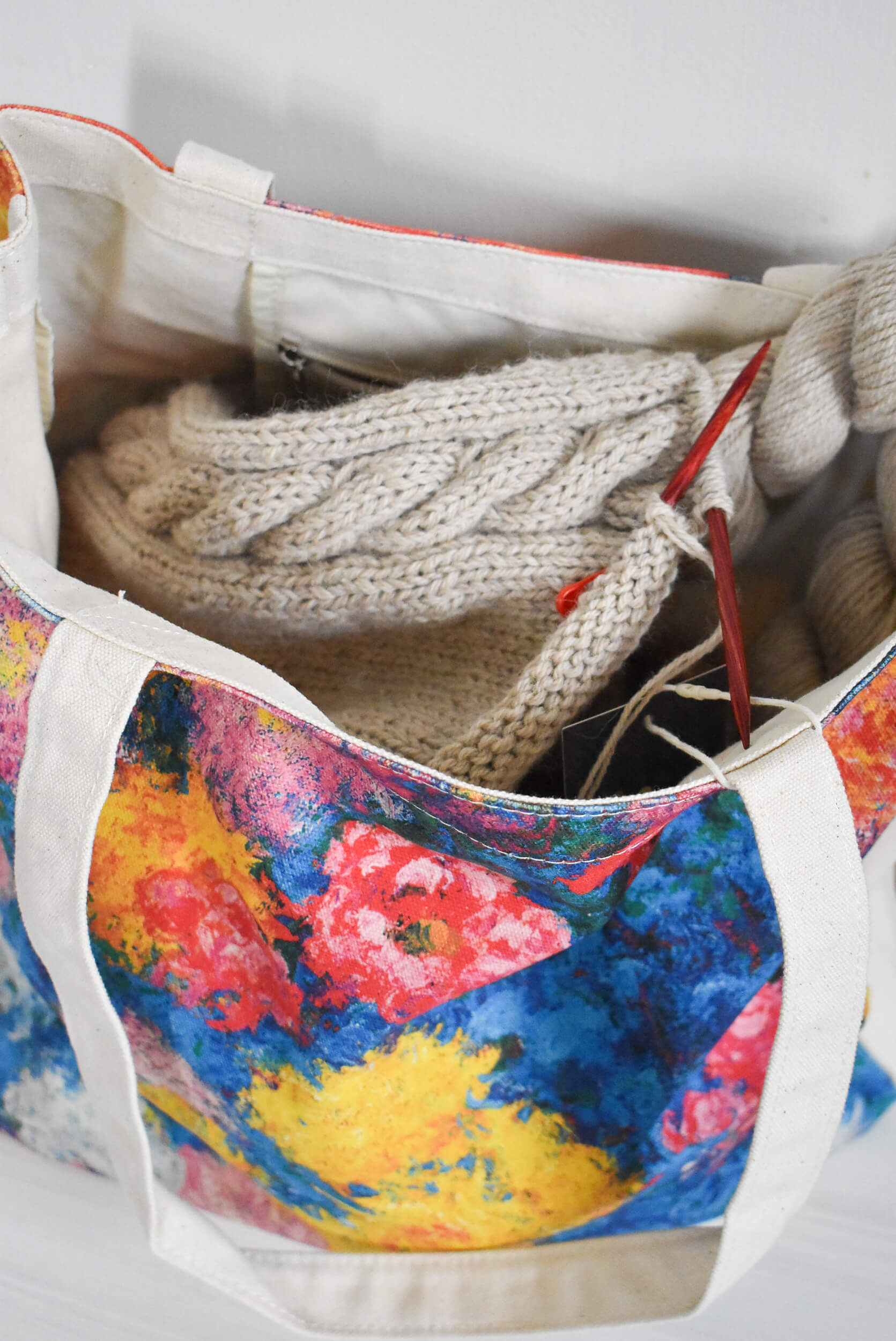 Colorful floral-patterned bag for knitting.