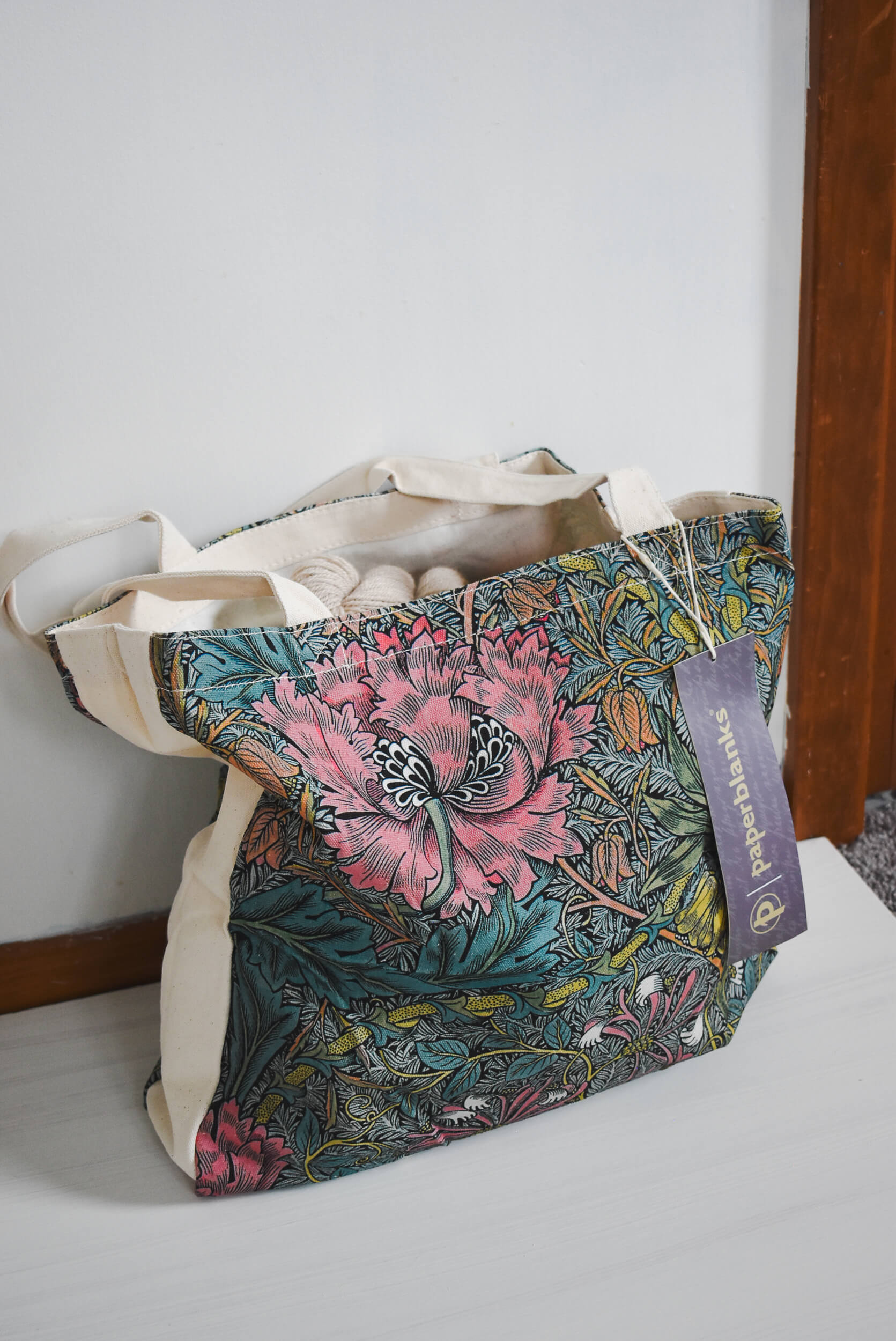 Floral-patterned bag with a William Morris design.