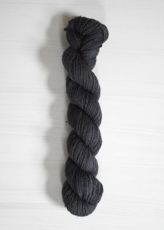 DK weight wool and alpaca yarn in navy blue.
