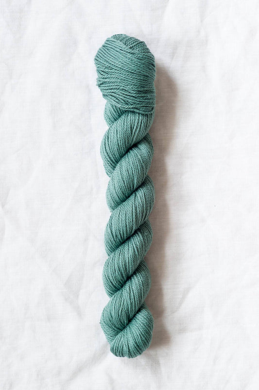Teal skein of Willet 100% organic cotton yarn by Quince & Co.