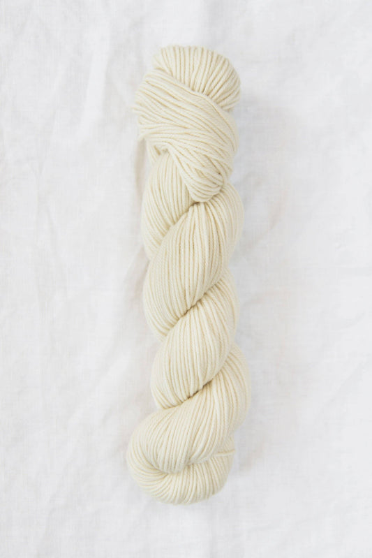 DK weight natural white yarn, 100% American wool.