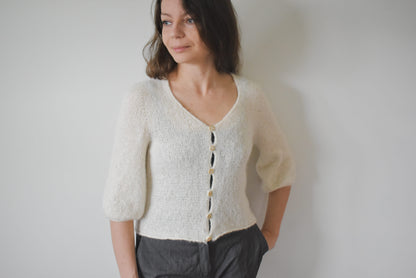 Cardigan knitting pattern with set-in sleeves.