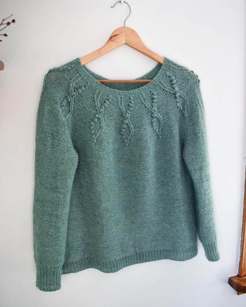 Top down sweater knitting pattern with bobbles.