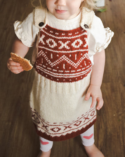 XOXO Christmas dress knitting pattern for toddlers.
