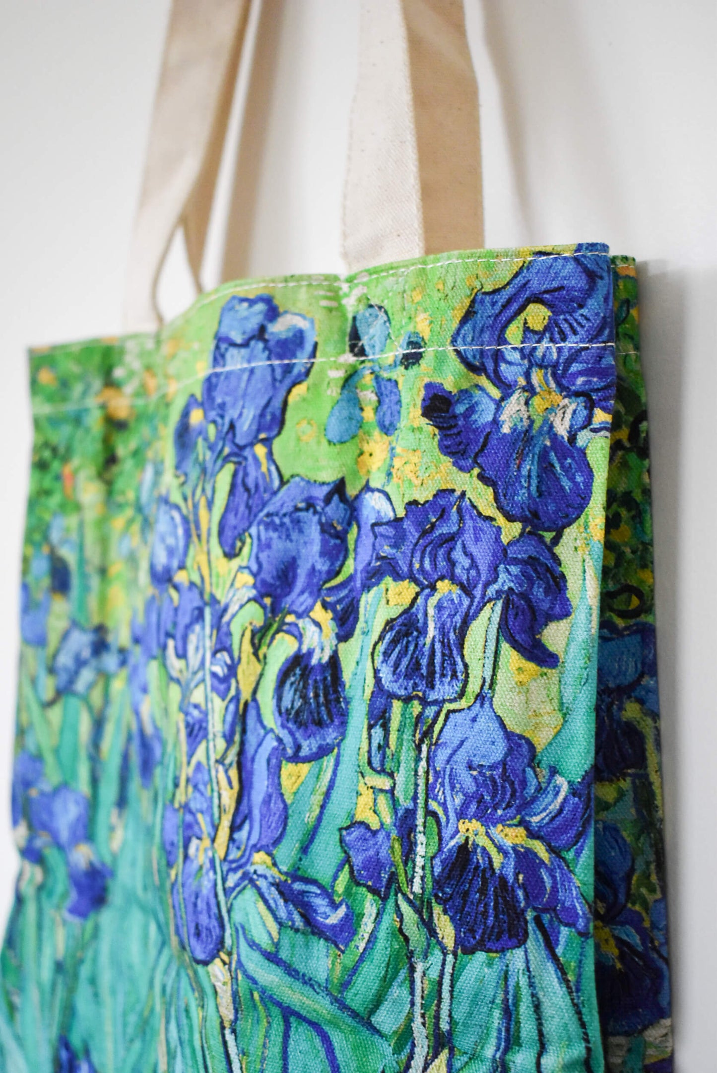 Knitting tote bag with blue floral design.