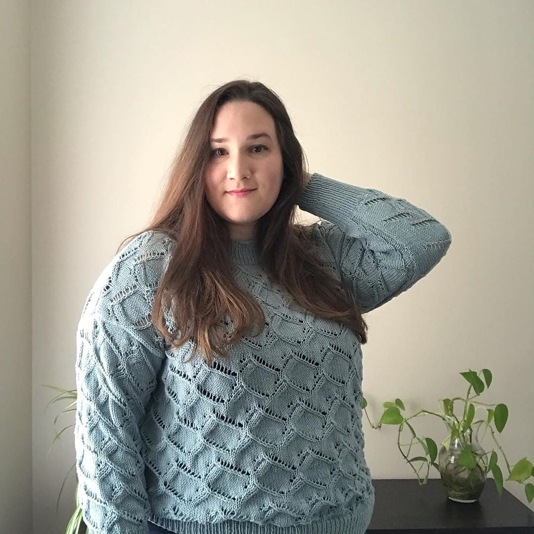 Waterscapes Pattern worked in a blue cotton yarn, shown in plus size.