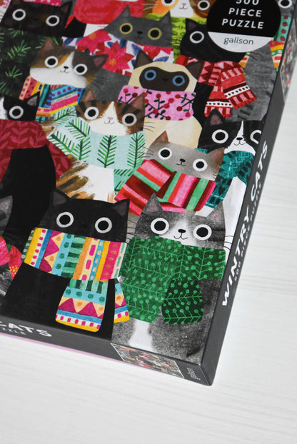 Cats wearing scarves puzzle.